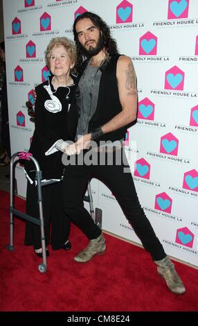 Oct. 27, 2012 - Los Angeles, California, U.S. - Russell Brand, Peggy Albrecht    attend  Friendly House LA Annual Awards Luncheon Gala Honoring Viola Davis on 27th  October 2012 at The Beverly Hilton Hotel,Beverly Hills,CA.USA.(Credit Image: © TLeopold/Globe Photos/ZUMAPRESS.com) Stock Photo