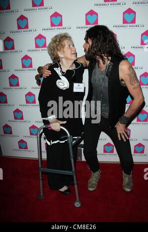 Oct. 27, 2012 - Los Angeles, California, U.S. - Russell Brand, Peggy Albrecht    attend  Friendly House LA Annual Awards Luncheon Gala Honoring Viola Davis on 27th  October 2012 at The Beverly Hilton Hotel,Beverly Hills,CA.USA.(Credit Image: © TLeopold/Globe Photos/ZUMAPRESS.com) Stock Photo