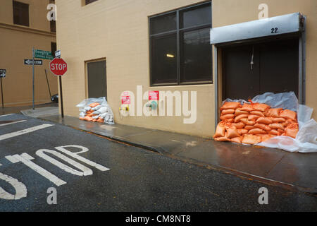 October 29, 2012, Brooklyn, NY, US.  Sandbags piled in front of entrances of apartment building in Brooklyn Heights during Hurricane  Sandy. Stock Photo