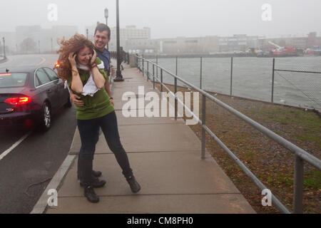 Oct. 29, 2012 - South Boston, Massachusetts, U.S - Spectators come to watch waves break along the shore in South Boston, Massachusetts during Hurricane Sandy on Monday, October 29, 2012. (Credit Image: © Nicolaus Czarnecki/ZUMAPRESS.com) Stock Photo