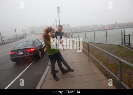 Oct. 29, 2012 - South Boston, Massachusetts, U.S - Spectators come to watch waves break along the shore in South Boston, Massachusetts during Hurricane Sandy on Monday, October 29, 2012. (Credit Image: © Nicolaus Czarnecki/ZUMAPRESS.com) Stock Photo