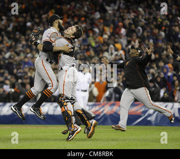 28.10.2012. Detroit, Michigan, USA. San Francisco Giants relief pitcher SERGIO ROMO and catcher BUSTER POSEY celebrate a 4-3 victory over the Detroit Tigers in the 10th inning of Game 4 of the 2012 World Series at Comerica Park. The Giants swept the series with the win Stock Photo
