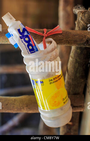 Oct. 29, 2012 - Mayo, Pattani, Thailand - Toothbrush and toothpaste in front of a patient's room at the Bukit Kong home. The home opened 27 years ago as a Pondo School, or traditional Islamic school, in the Mayo district of Pattani. Shortly after it opened, people asked the headmaster to look after individuals with mental illness. (Credit Image: © Jack Kurtz/ZUMAPRESS.com) Stock Photo