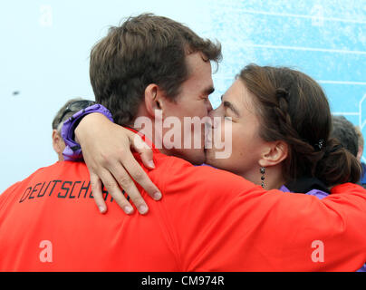 27.06.2012. Helsinki, Finland.  Arne Gabius of Germany kisses his Girlfriend Anne Schroth after the medal ceremony for the 5000 meter of the European Athletics Championships 2012 at the Olympic stadium in Helsinki, Finland, 27 June 2012. The European Athletics Championships take place in Helsinki from the 27 June to 01 July 2012. Stock Photo