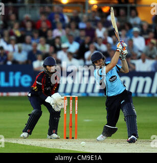 28.06.12 Chelmsford, ENGLAND: Luke Wright hits a boundary for Sussex whilst batting 28.06.2012 Chelmsford, Essex. T20 Essex Eagles vs Sussex Sharks.  Action at the Ford County Ground, Chelmsford, Essex. Stock Photo