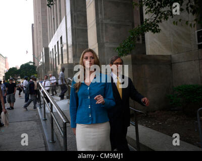 The alleged accomplice of A. Gristina, Jaynie Mae Baker at the courthouse with her lawyer Robert Gottlieb and her sister Jessica. Accused Manhattan madam Gristina, a mother of four who prosecutors say ran a profitable brothel, was released on bail after four months in jail. Stock Photo