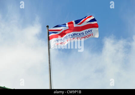 Whitehall, London, UK. 30th June 2012. Armed forces Day, a flag flies on the Ministry of Defence building on Whitehall.. Stock Photo