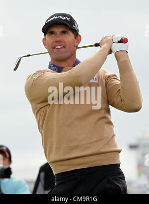 30.06.2012. County Antrim, Northern Ireland.  Ireland's Padraig Harrington watches on after hitting his shot into the 18th green during the third round of the Irish Open golf tournament on the European Tour hosted at Royal Portrush Golf Club, Portrush, County Antrim, Northern Ireland