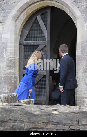 Cherington Gloucestershire,UK. 30 June, 2012. Autumn Phillips and Peter Phillips after the christening of their daughter Isla Phillips at St. Nicholas' Church in Cherington Stock Photo