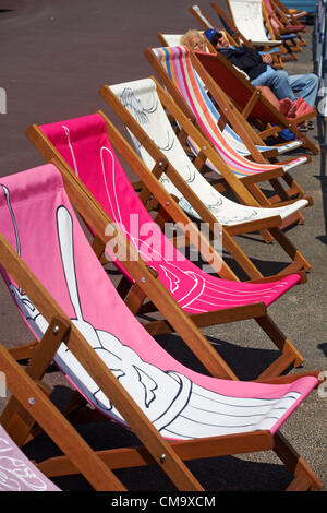 Weymouth, Dorset UK Saturday 30 June 2012. Weymouth Esplanade is decorated with 500 deckchairs designed by locals. Each design celebrates Weymouth and transforms the seafront. Stock Photo