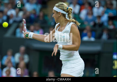 03.07.2012.  The All England Lawn Tennis and Croquet Club. London, England. Sabine Lisicki of Germany in action against Angelique Kerber of Germany during fourth round quarterfinals at Wimbledon Tennis Championships at The All England Lawn Tennis and Croquet Club. London, England, UK Stock Photo