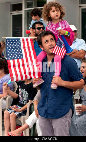 July 04, 2012 - Pacific Palisades, CA, USA -  Spectators watch the annual Pacific Palisades Americanism Parade.  Home to many familiar names from film and television, the wealthy suburb of Pacific Palisades maintains a small town feel on the outskirts of the megalopolis that is Los Angeles. Stock Photo