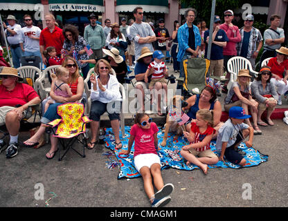 July 04, 2012 - Pacific Palisades, CA, USA -  Spectators watch the annual Pacific Palisades Americanism Parade.  Home to many familiar names from film and television, the wealthy suburb of Pacific Palisades maintains a small town feel on the outskirts of the megalopolis that is Los Angeles. Stock Photo