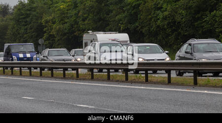 6th July 2012. Northampton UK. Traffic queues  on the A43 from the MI Junction 15A to the Silverstone Circuit, Towcester, Northamptonshire, England, UK. The Formula One Grand Prix of Great Britain will take place on 08th July 2012. The traffic is congested this morning  for 10 miles (16.1 km)  due to volume of vehicles trying to get to the Circuit for the weekend and heavy overnight rain. Stock Photo