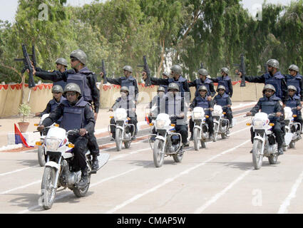 Sindh Police (SP) recruits march-past during passing out  parade ceremony held at Razzaqabad police training center in Karachi on Friday, July 06, 2012. Stock Photo