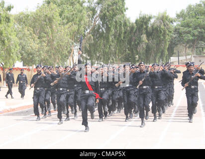 Sindh Police (SP) recruits march-past during passing out  parade ceremony held at Razzaqabad police training center in Karachi on Friday, July 06, 2012. Stock Photo