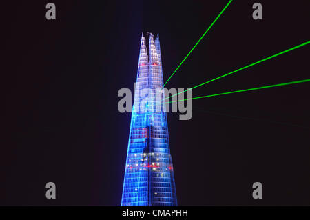 LONDON, 5 July 2012. The inauguration of The Shard, Western Europe's tallest building at 310 m (1,016 ft) is marked by a laser light show.  The skyscraper is to be a vertical city of high-quality offices, world-renowned restaurants, the 5-star Shangri-La hotel, exclusive residential apartments and the capital's highest viewing gallery offering 360° views. Stock Photo