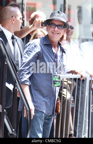 CHARLIE SHEEN SLASH HONORED WITH STAR ON THE HOLLYWOOD WALK OF FAME HOLLYWOOD LOS ANGELES CALIFORNIA USA 10 July 2012 Stock Photo