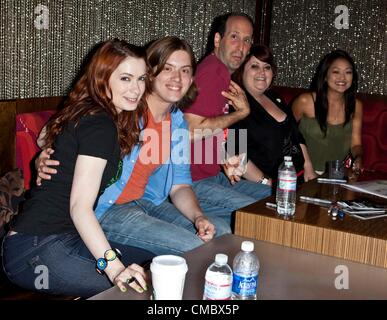 Felicia Day, Vincent Caso, Jeff Lewis, Robin Thorsen, Amy Okuda, The Guild actors at The Geek signing autographs inside for Comic-Con 2012 Opening Day - THU, San Diego Convention Center, San Diego, CA July 12, 2012. Photo By: Emiley Schweich/Everett Collection Stock Photo