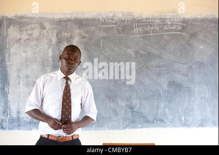 June 18, 2012 - Chikupo (Village, Zimbabwe - June 18, 2012, Murewa, Zimbabwe - A teacher at the Chikupo Secondary School in the Murewa District of Zimbabwe teaches a health class after he himself was trained by CRS through partner agency the Community Technology Development Trust (CTDT). Health and hygiene are key elements of CRS efforts to combat food insecurity through the Protracted Recovery Program (PRP) (Credit Image: © David Snyder/ZUMAPRESS.com) Stock Photo