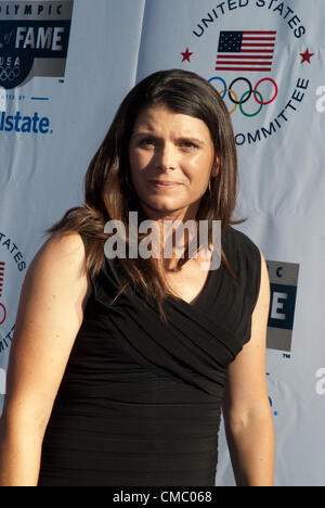 FIFA Women's World Cup - Forward Mia Hamm #9 of the USA poses for a picture  with friends, family, and husband Nomar Garciaparra during a post-game  ceremony