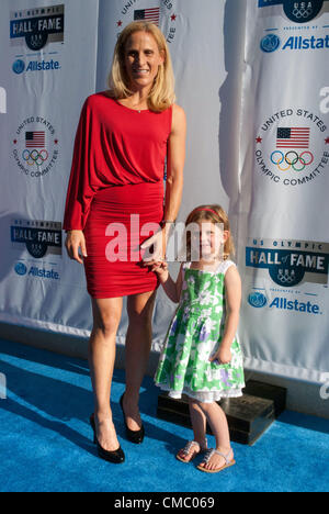 July 13, 2012 - Chicago, Illinois, U.S. - Soccer great KRISTINE LILLY who played in three Olympic Games during her 24 year career in soccer, was inducted into the U.S. Olympic Hall of Fame at the Harris Theater in Chicago.  She made 352 international appearances, a world record for both women and men. She walked the blue carpet with her daughter SYDNEY before the induction ceremony. (Credit Image: © Karen I. Hirsch/ZUMAPRESS.com) Stock Photo