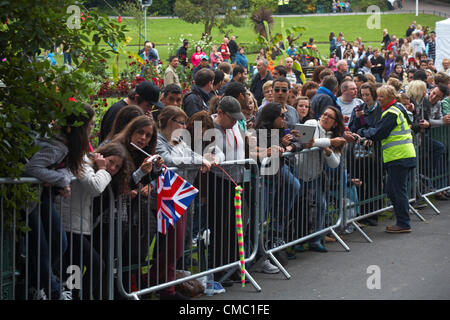 Bournemouth, UK Friday 13 July 2012. Olympic Torch Relay at Bournemouth, UK - crowds wait patiently for the torch at the Lower Gardens at Bournemouth on Friday evening Stock Photo