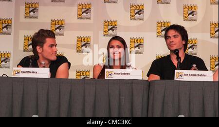 Paul Wesley, Nina Dobrev, Ian Somerhalder, at VAMPIRE DIARIES panel discussion inside for Comic-Con International 2012 - SAT, San Diego Convention Center, San Diego, CA July 14, 2012. Photo By: Emiley Schweich/Everett Collection Stock Photo