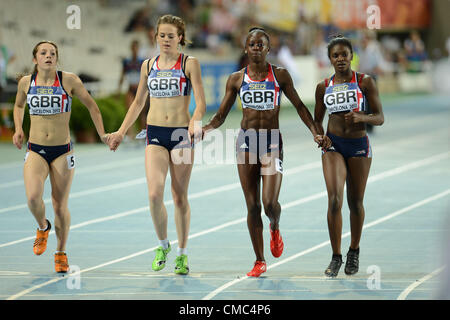BARCELONA, Spain: Saturday 14 July 2012, Sophie Papps, Rachel Johncock, Dina Asher-Smith and Desiree Henry of Great Britain's 4x100m relay team cross the finish line together after the baton dropped and they did not finish the race during day 5 of the IAAF World Junior Championships at the Estadi Olimpic de Montjuic. Photo by Roger Sedres/ImageSA Stock Photo
