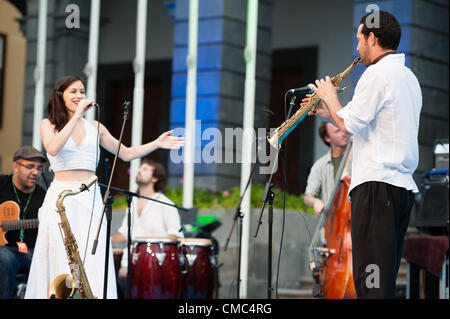 July 14, 2012 – Las Palmas, Canary Islands, Spain – Composer and saxophonist Jose Angel Vera Bello (right), settled in Holland, onstage with the band Manao, during festival international canarias jazz & mas Heineken, in Plaza Santa Ana, Las Palmas, Canary Islands, on Saturday 14 July 2012. Singer Lara Bello to left. Stock Photo