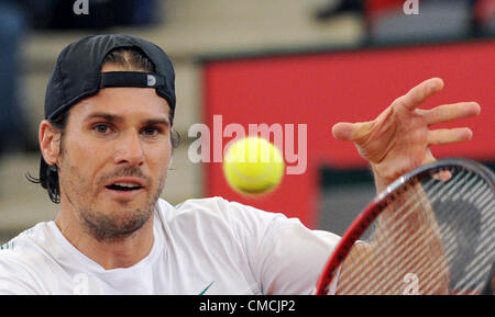 18.07.2012. Hamburg, Germany.  Germany's Tommy Haas plays against France's Simon at the ATPWorld Tour 500 tournament at Rothenbaum in Hamburg, Germany, 18 July 2012. Stock Photo