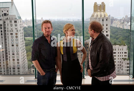 Australian actors Richard Roxburgh (L) and Cate Blanchett will star in the Sydney Theatre Companys' production of the  Chekhov play Uncle Vanya at the Lincoln Center in New York City. They are pictured July 19, 2012 at the  Meridien hotel with Cate Blanchetts' husband and co- artistic director of the company Andrew Upton. Stock Photo