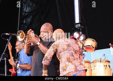 London, UK, Saturday 21 July 2012.  South African jazz musician Hugh Masekela and Beninoise singer-songwriter, Angélique Kidjo performing at the BT River of Music Festival.  Part of the London Cultural Olympiad, leading up to the 2012 Olympics in London, the BT River of Music Festival is being held across London this weekend with each stage featuring music from a specific part of the world. The venue for the Africa Stage is the newly opened London Pleasure Gardens, at the Pontoon Dock in London's Docklands. Stock Photo