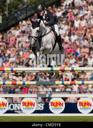 22.07.2012.  The All England Jumping Course  Hickstead, England. Tim Stockdale (GBR) riding Fresh Direct K2 in action during the Longines King George V Cup at The Longines Royal International Horse Show. Stock Photo