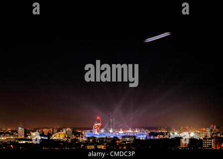 A zeppelin is watching around over the Olympic Stadium. Rehearsal for the Opening Ceremony was held on 23rd July, in London, UK. Stock Photo