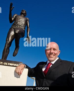 Olympic Gold Medallist Steve Ovett with sculptor Pete Webster's statue of him which was unveiled today. Tuesday 24th July 2012 photo©Julia Claxton Stock Photo