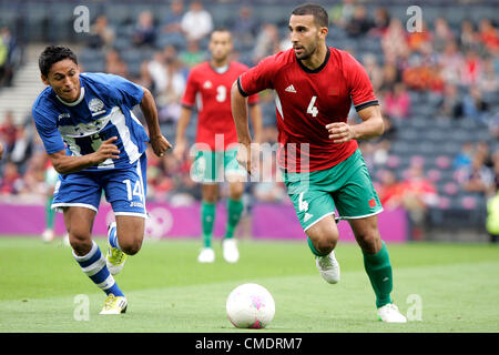 26.07.2012 Glasgow, Scotland. 14 Andy Najar and 4 Abdelhamid El Kaoutari in action during the Olympic Football Men's Preliminary game between Honduras and Morocco from Hampden Park. Stock Photo