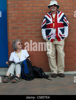 Manchester, UK. 26th July, 2012. Two Great Britain fans wait outside Old Trafford, Manchester United's ground, where the first Olympic Football matches at the ground were to be played later in the afternoon. Uruguay v United Arab Emirates was to be followed by Great Britain v Senegal, 26-07-2012 Stock Photo