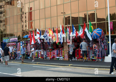 Manchester, UK. 26th July, 2012. A stall selling flags and scarves near Old Trafford, Manchester United's ground, where the first Olympic Football matches at the ground were to be played later in the afternoon. Uruguay v United Arab Emirates was to be followed by Great Britain v Senegal, 26-07-2012 Stock Photo