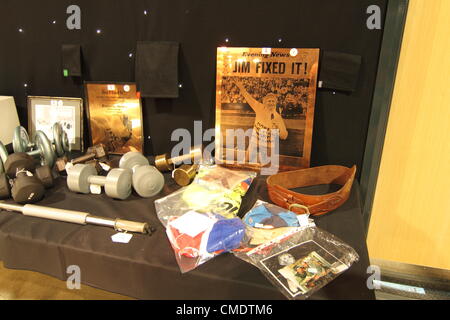 Leeds, UK. 26th July, 2012. Sir Jimmy Savile's  dumb bells memorabilia on show in Leeds before being auctioned at the royal armories  leeds on 30th July, 2012. Stock Photo