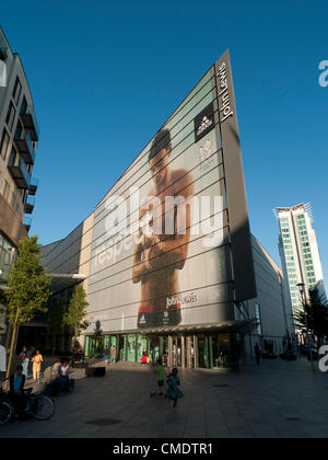 July 25, 2012 Cardiff, Wales, United Kingdom. John Lewis’s  Cardiff store celebrates British diving champion and Team GB Olympic athlete Tom Daley in it’s summer  advertising campaign with a gigantic image on the side of the building .  John Lewis were chosen to be the official department store for the 2012 Olympics and are supported here by sponsor Adidas. Stock Photo