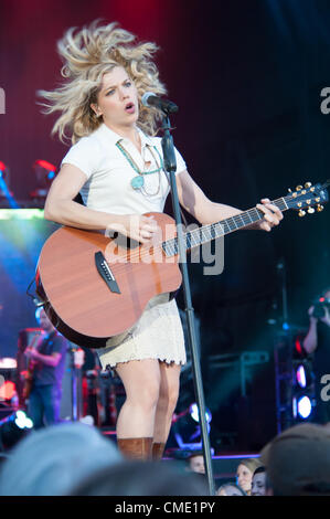 WHEATLAND, CA - JULY 26: Kimberly Perry of The Band Perry performs in part of Brad Paisley's Virtual Reality Tour 2012 at Sleep Train Amphitheatre on July 26, 2012 in Wheatland, California. (photo by Randy Miramontez) Stock Photo