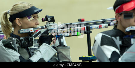 28.07.2012 London, England.  Beate Gauss of Germany competes in the womens 10 meter air rifle qualifying round during in The Royal Artillery Barracks at the London 2012 Olympic Games, London, Great Britain, 28. July 2012. Stock Photo