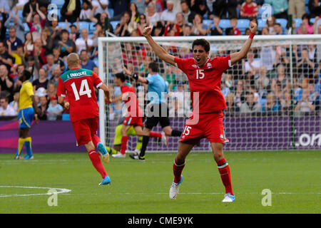 29.07.2012 Coventry, England. Giovani DOS SANTOS (Mexico) scores the opening goal and Nestor VIDRIO (Mexico) jumps for joy during the Olympic Football Men's Preliminary game between Mexico and Gabon from the City of Coventry Stadium Stock Photo