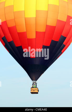 Hot air balloons flying at the 30th Annual Quick Chek Festival of Ballooning at Thor Soldberg Airport in Readington, New Jersey on July 28, 2012. The festival is one of the largest in the United States. Stock Photo