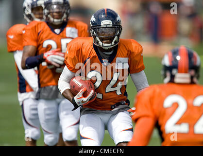 Denver Broncos CB Champ Bailey (L) hangs his head alongside