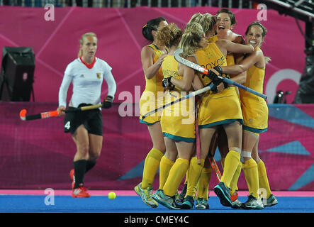 31.07.2012. London England. Australia's team celebrates the third goal during women's field hockey preliminary round match against Germany at Riverbank Arena for the London 2012 Olympic Games, London, Britain, 31 July 2012. Stock Photo