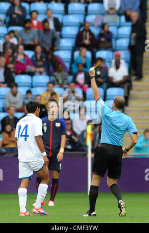 01.08.2012 Coventry, England. Andy NAJAR (Honduras) is shown the yellow card during the Olympic Football Men's Preliminary game between Japan and Honduras from the City of Coventry Stadium Stock Photo