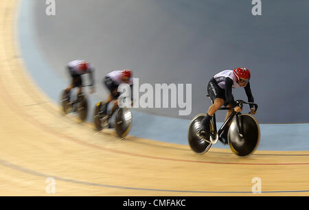 02.08.2012.  London England. Chris Hoy, Jason Kenny and Philip Hindes of team Great Britain compete in the Men's team sprint qualifying heat of the track cycling event in Velodrom at the London 2012 Olympic Games, London Stock Photo