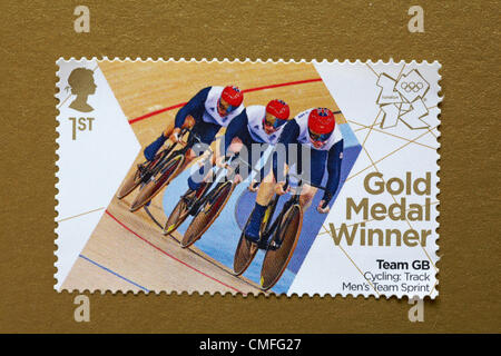 UK Friday 3 August 2012. Stamp to honour gold medal winner Team GB Cycling Track Men's Team Sprint event - Sir Chris Hoy, Jason Kenny and Philip Hindes. Stamp purchased and stuck on gold to send to Olympic supporter. Stock Photo